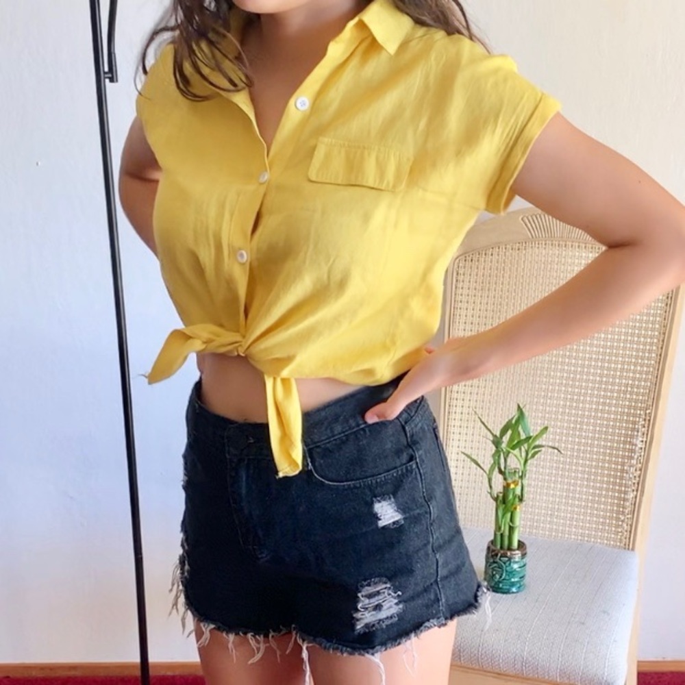 yellow button up shirt
